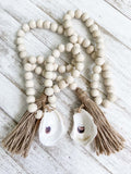 Oyster Shell Wooden Bead Garland with Tassels image 1